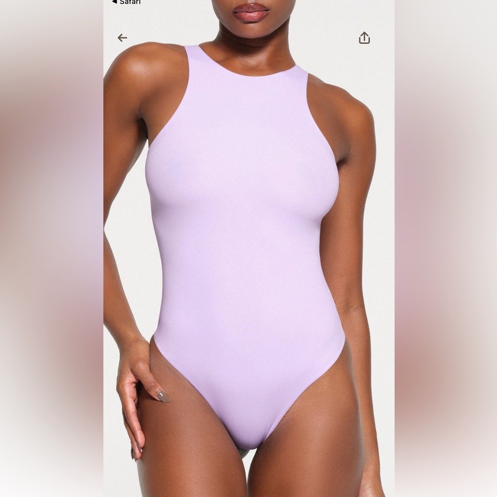 NWT Skims fits everybody. High neck ‘Lily’ bodysuit S